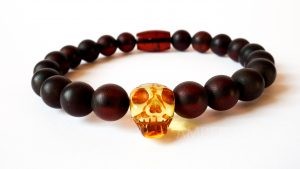 Unisex Dark Red Amber Bracelet With A Skull