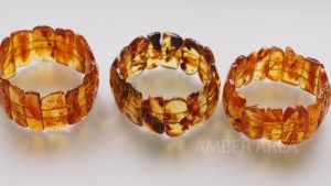 Baltic amber bracelet with uneven ends, plate wholesale